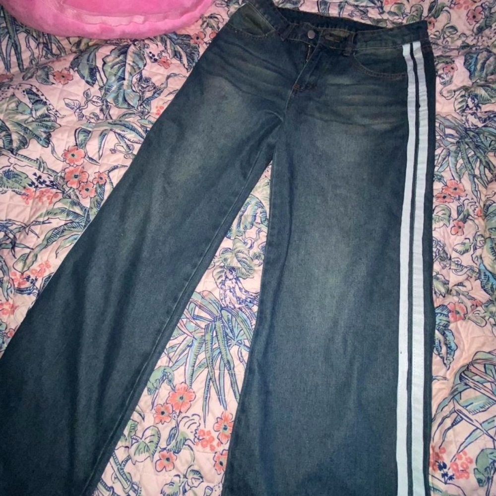 Navy blue low-rise wide-leg jeans with white stripes